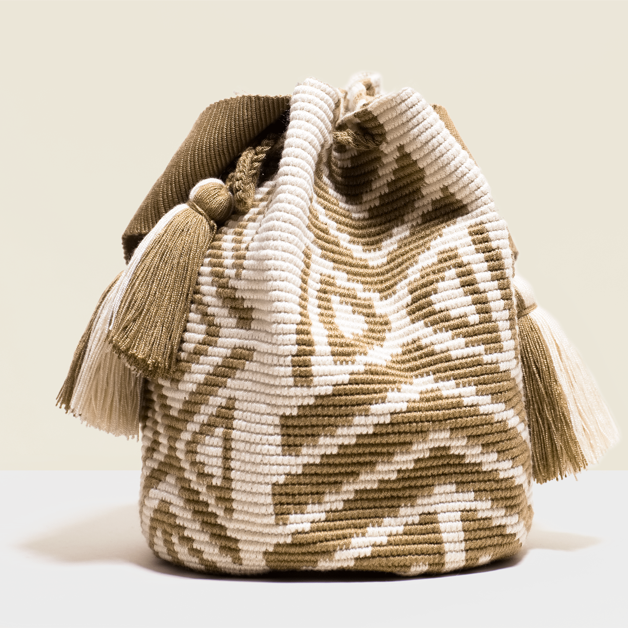 Boho chic crochet bag with brown geometrical design on cream base. Tassels to match, Washable.