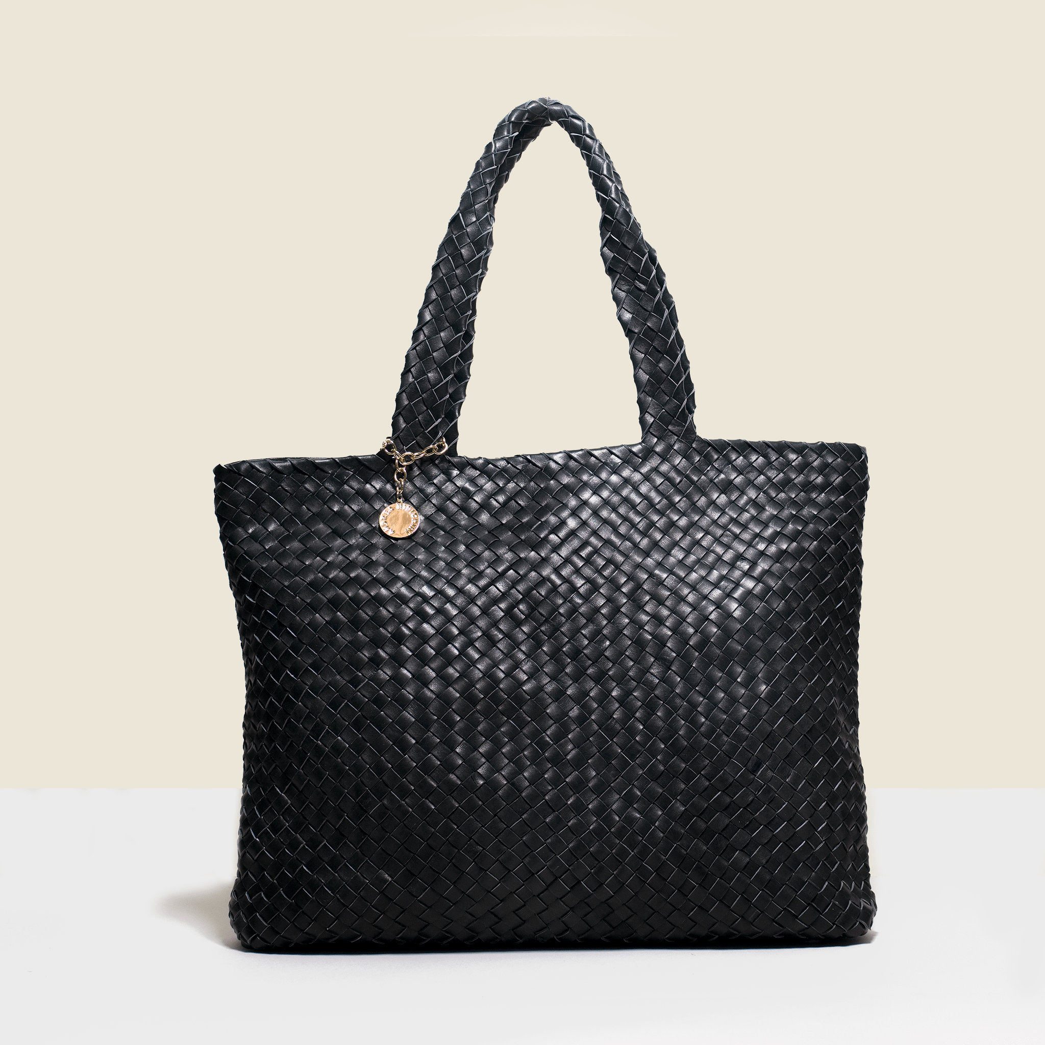 Shopper style black woven leather bag