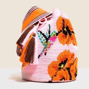 Pink boho chic crochet  bag with orange flowers and a bird design