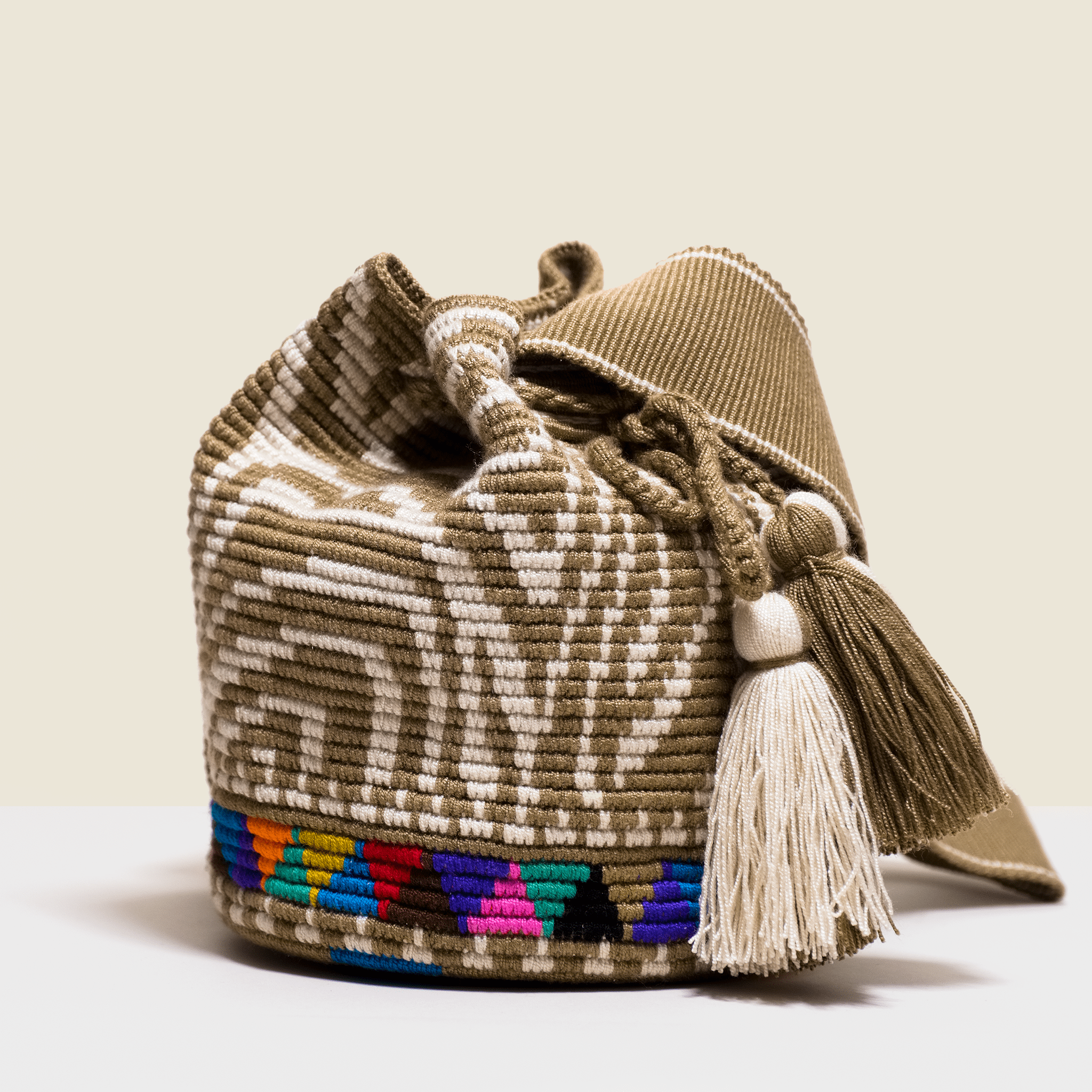 Boho chic bag in cream and camel with zebra design. Tassels to match. Cross - body bag