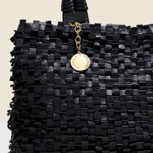 Woven leather bag in black. Handmade in Italy