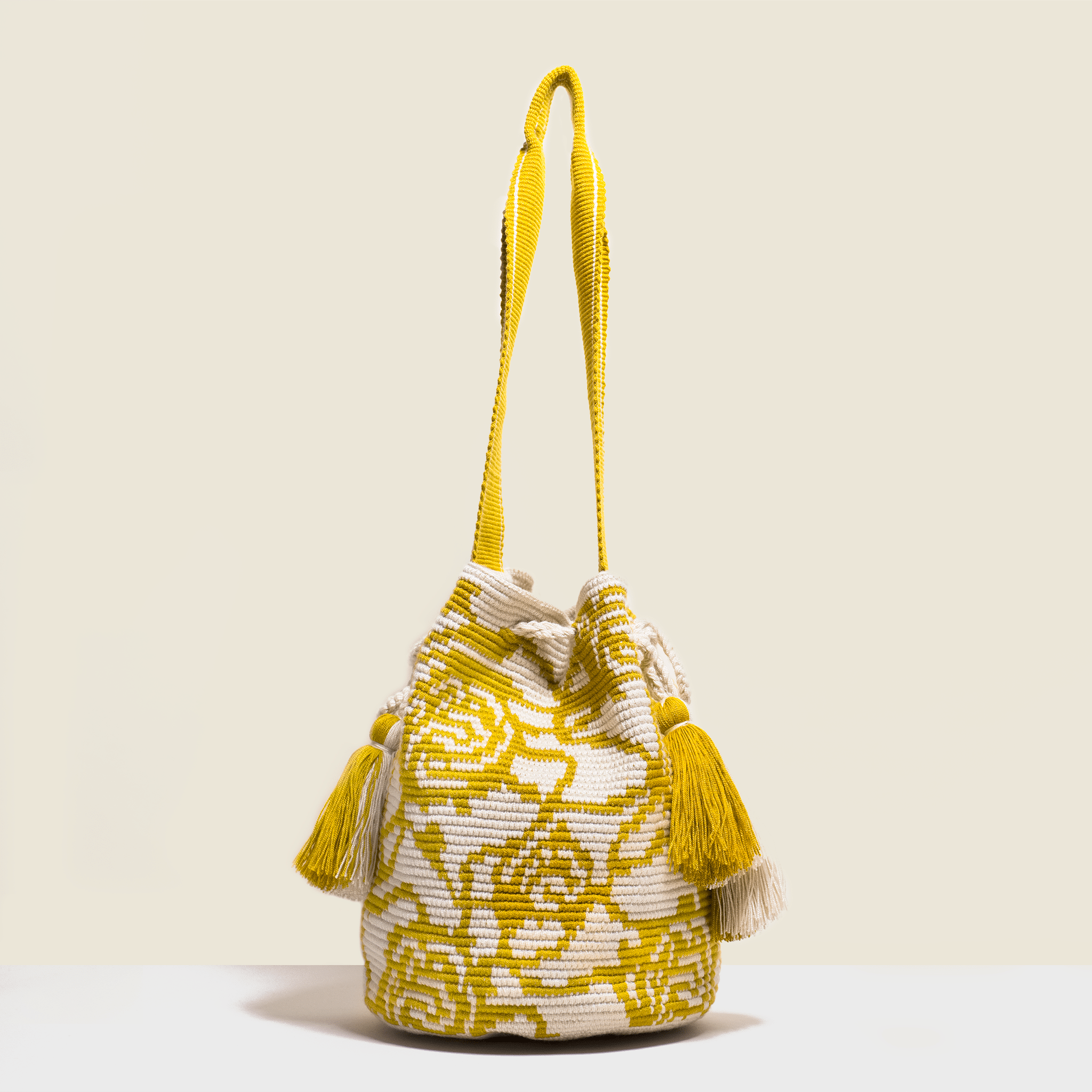 Boho chic bag in cream with details of saffron yellow roses. Cross-body bag. with tassels. 